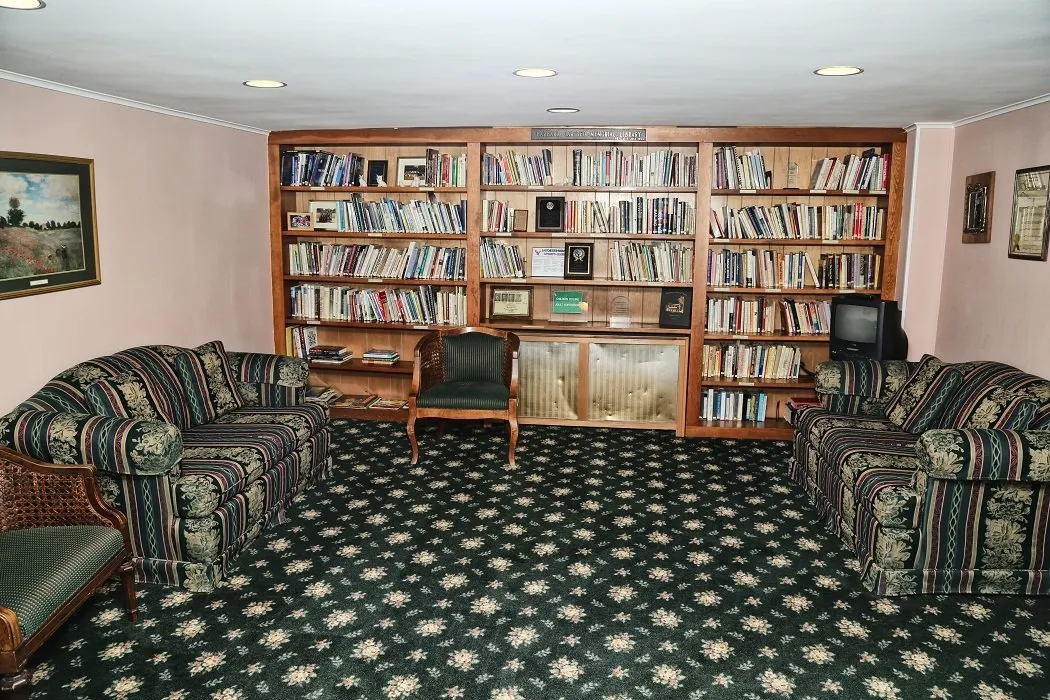 funeral room lounge area bookcase