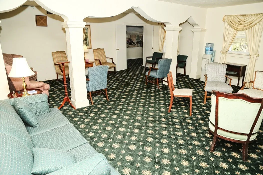 local funeral home lounge area with chairs