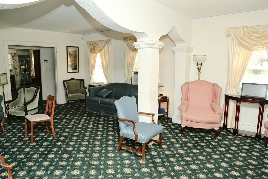 funeral home facilities lounge area with various chairs