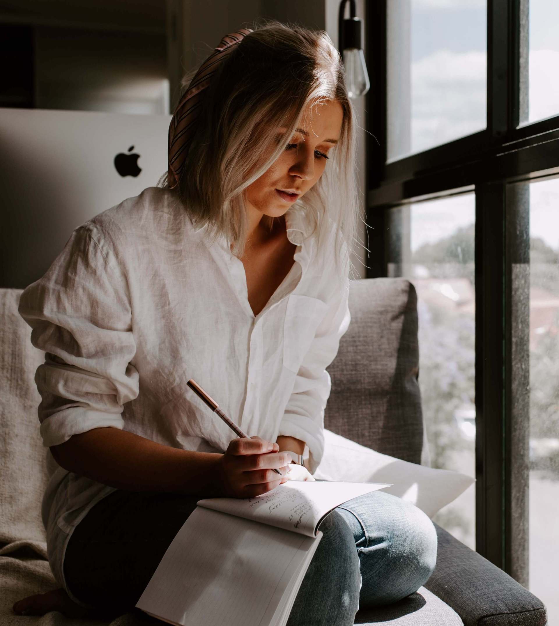 woman writing a eulogy