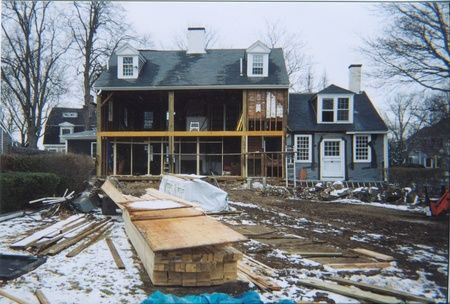 A house that is being remodeled in the snow
