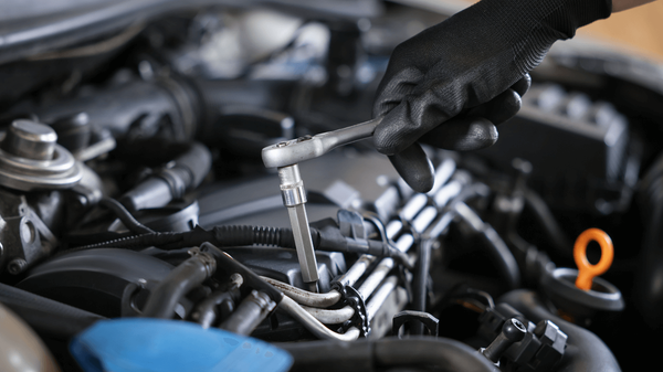 a mechanic doing a brake service