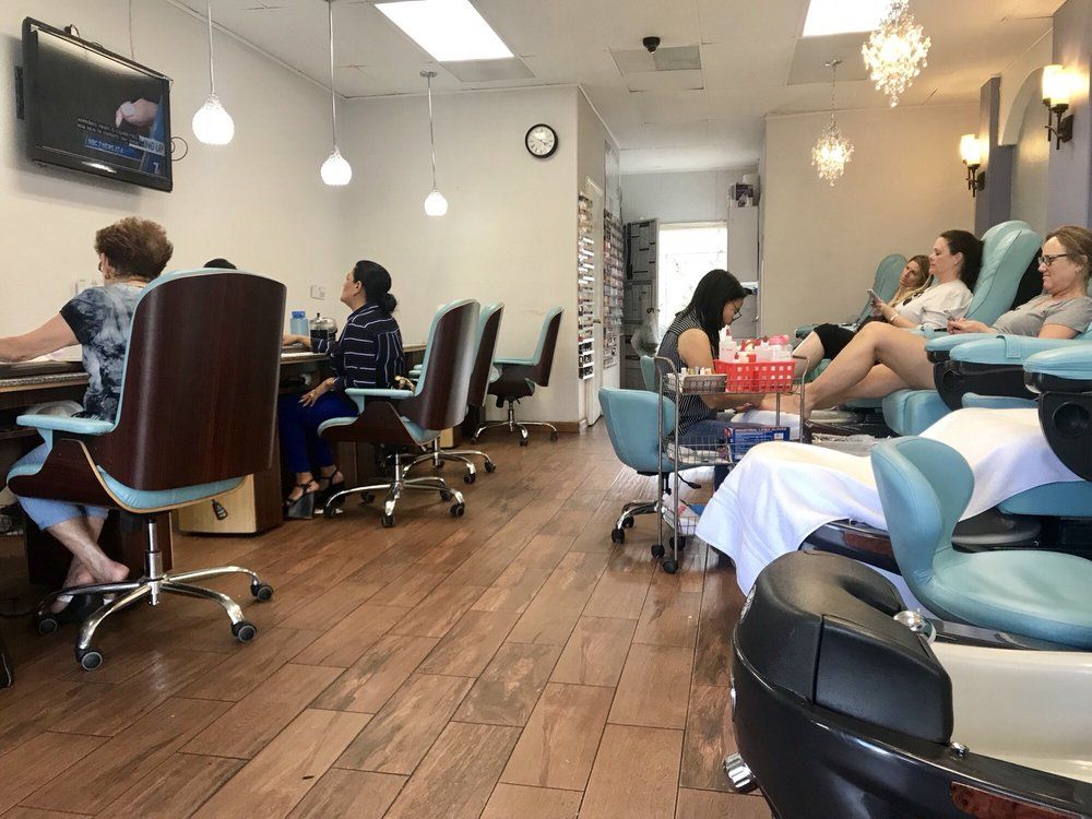 A Room With People Sitting In Chairs — San Diego, CA — Summer Nails and Spa