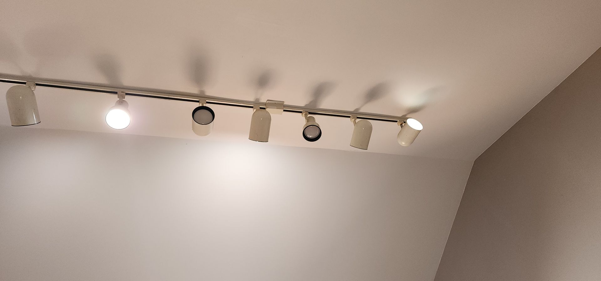 A ceiling with a lot of lights on it