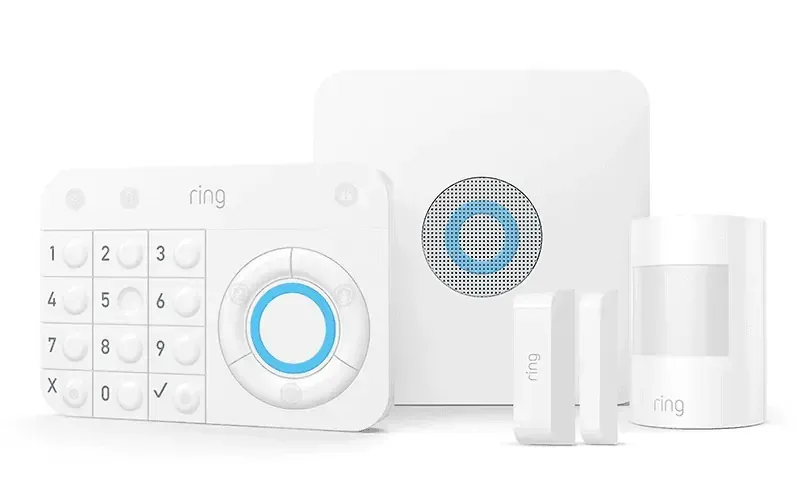 Two security cameras are attached to a gray wall.