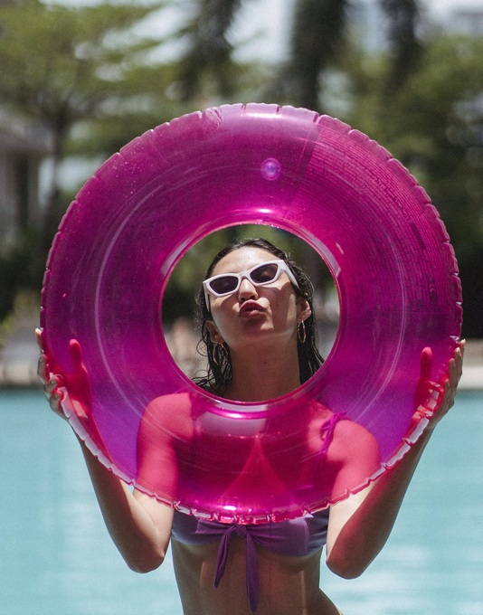 Pool user Holding Floaty