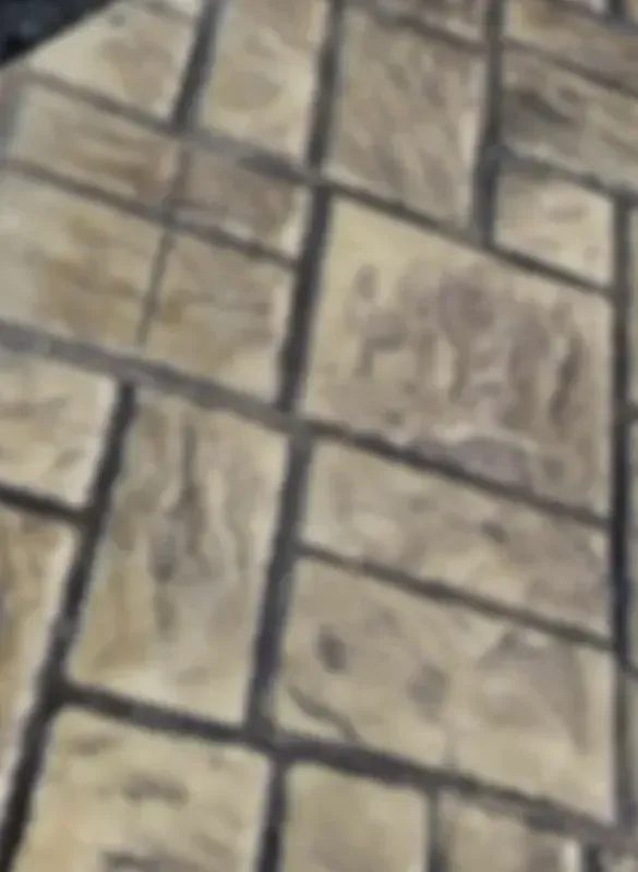 a close up of a stamped concrete floor with a diagonal brick pattern in Bellingham Washington.