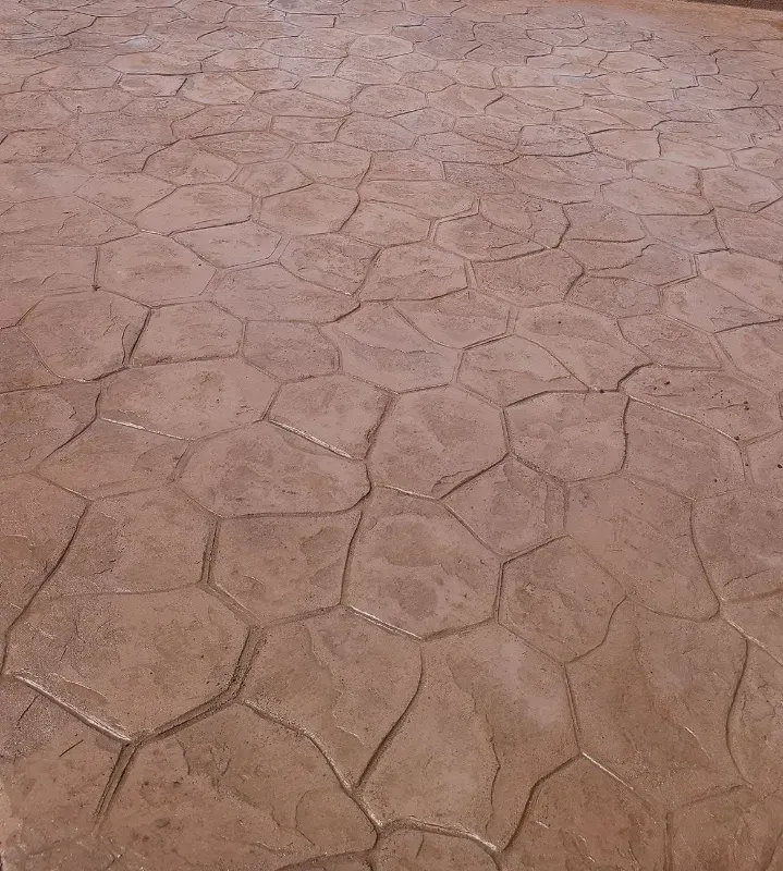 a close up of a brick floor with a geometric pattern