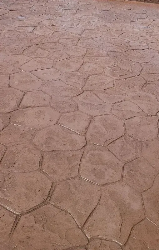 A close up of a concrete floor with a geometric pattern.