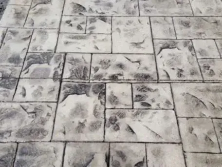a black and white photo of a stamped concrete brick floor in Bellingham Washington.