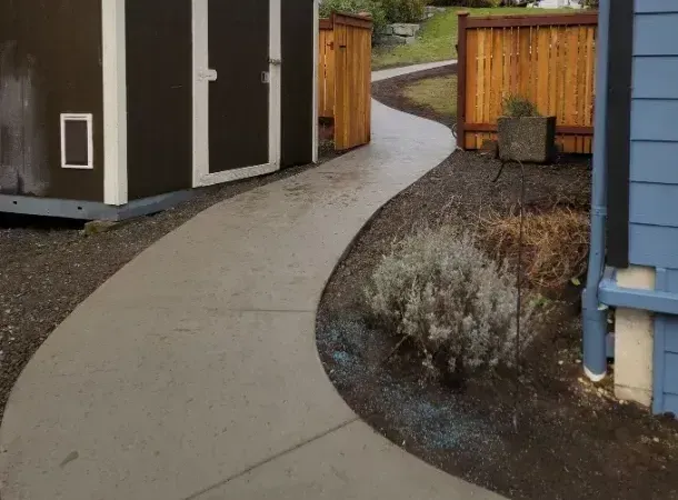 A smooth and durable newly installed concrete driveway in Bellingham, WA