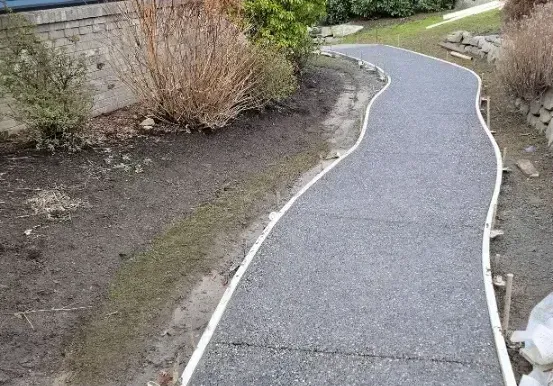 A smooth and durable newly installed concrete driveway in Bellingham, WA