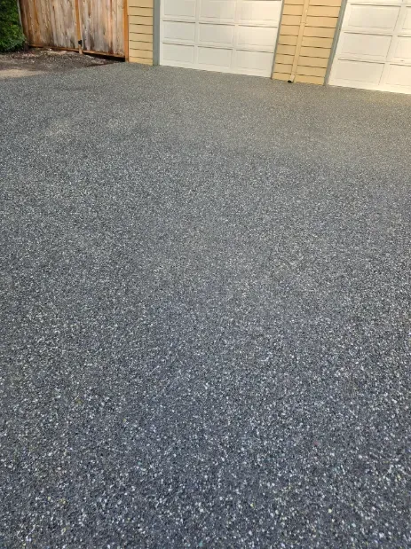 Stone steps, close-up view. Textured, light-colored granite construction.