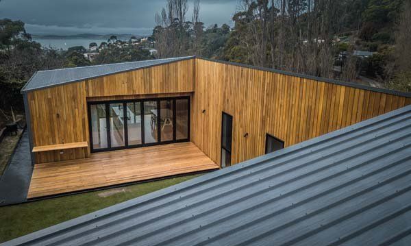 wooden panel tin roof home