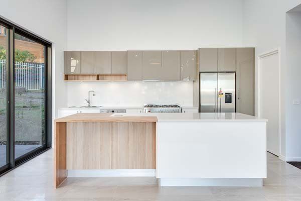 natural lighting white kitchen space