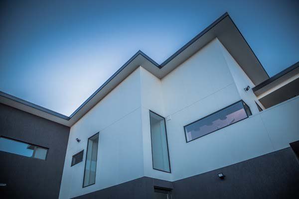 boxy modern house at dusk