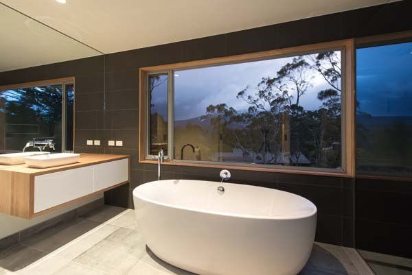 exposed bathtub with window view