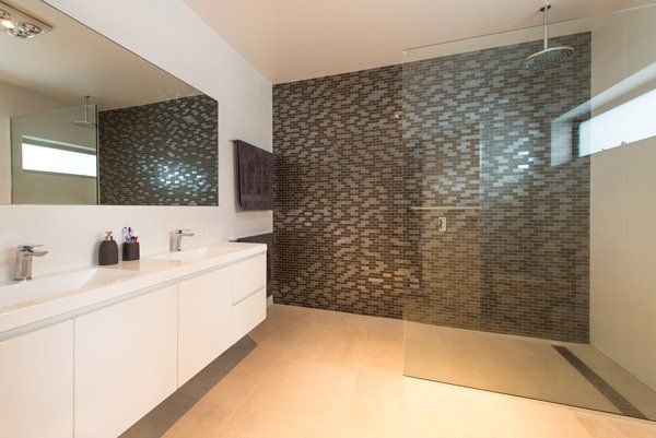 modern bathroom with custom textured wall