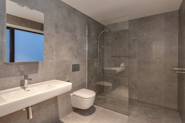 modern bathroom with tile walls