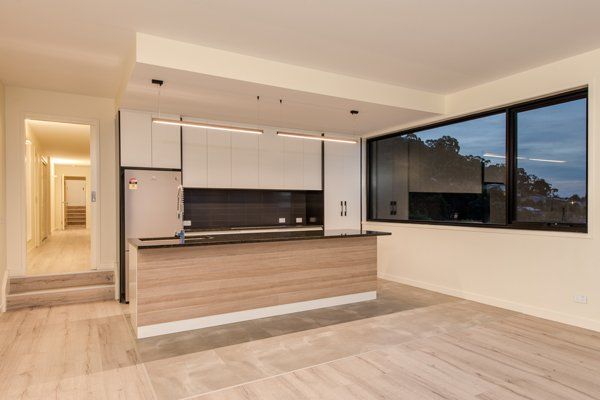 modern wood island on wood floors