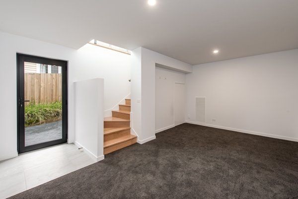 living area with white walls