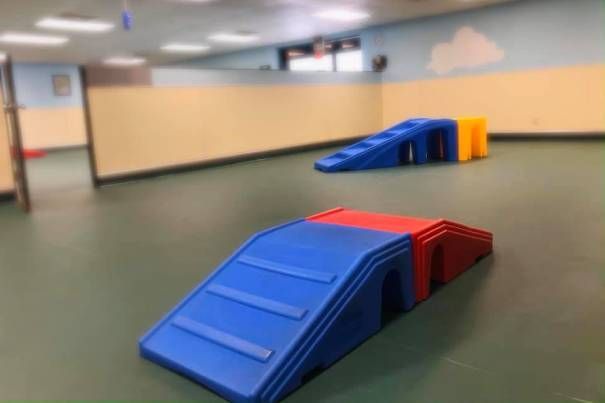 A room with a lot of toys on the floor