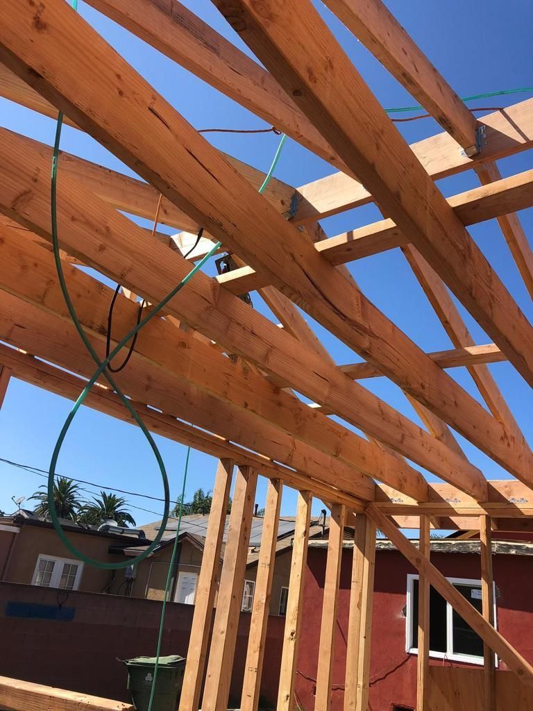 Looking up at the roof of a house under construction