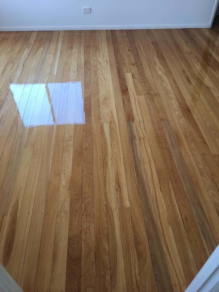 shiny wood floors in empty room