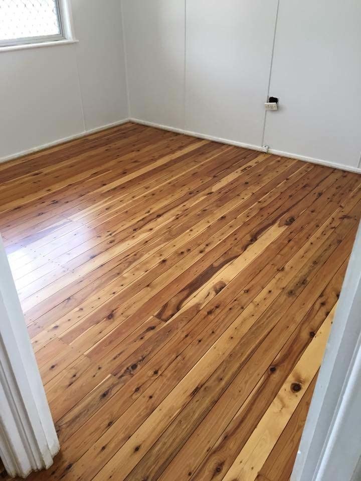 empty bedroom with wood floors