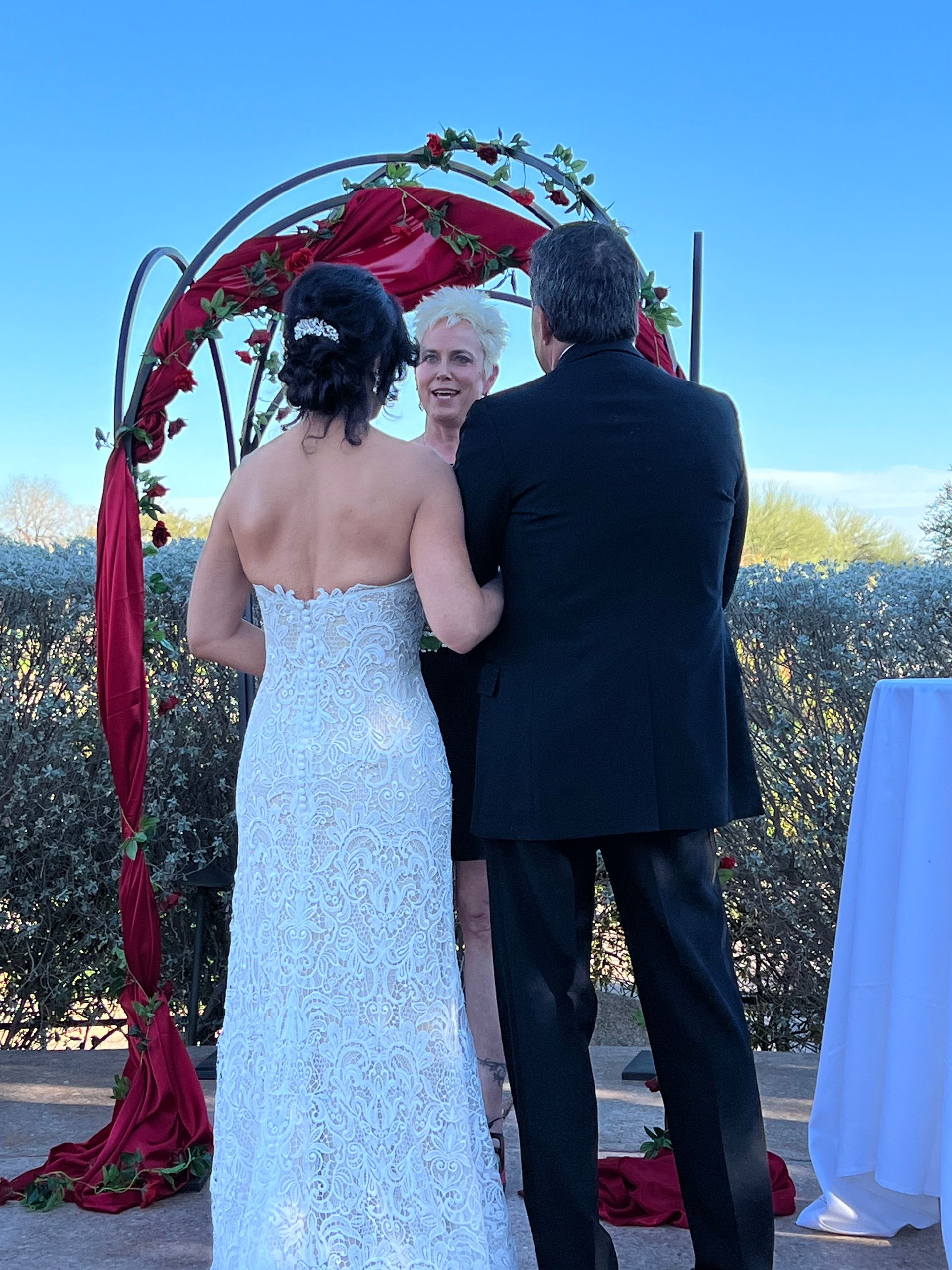 Julie performs a wedding ceremony for a couple