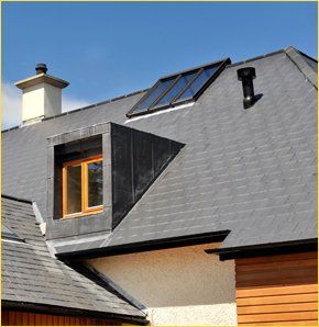 New build with dark roof tiles in Camborne