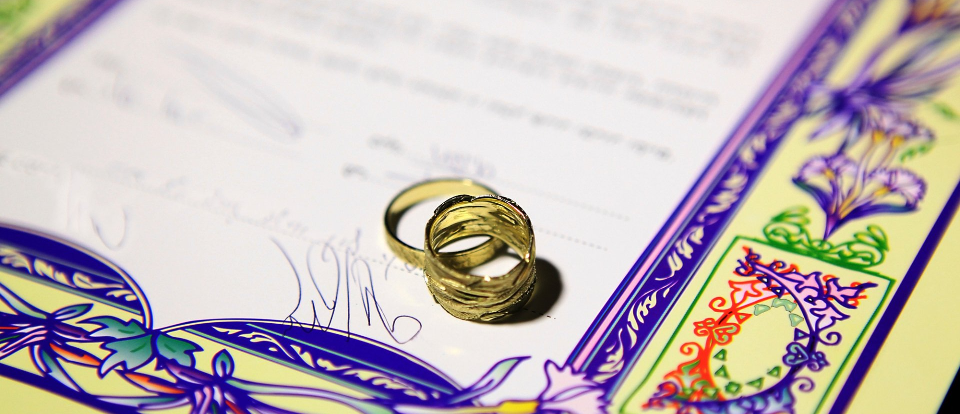 marriage contract with rings on top