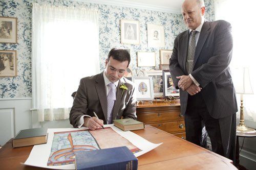Jewish groom signing the Ketuba contract