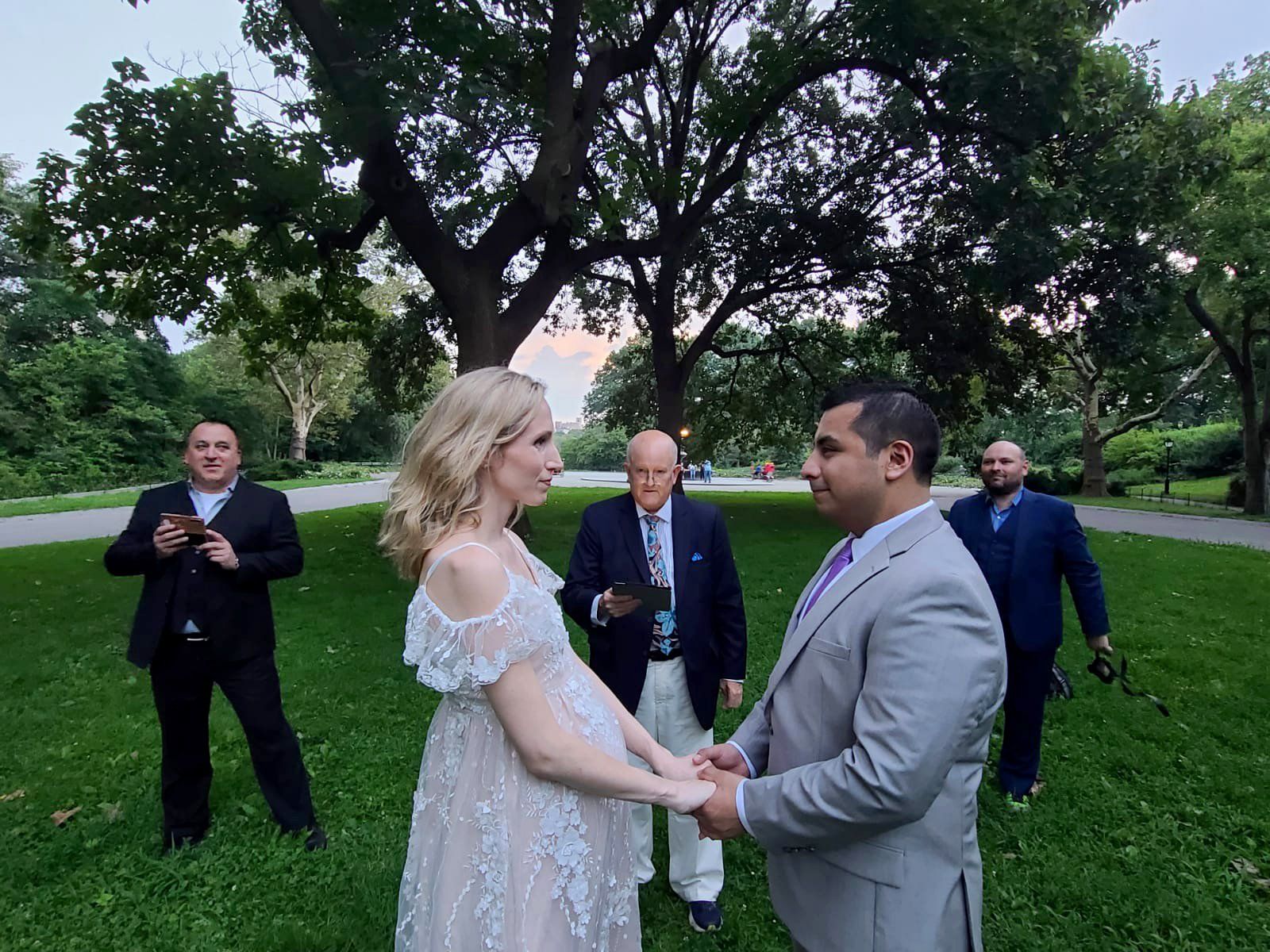 Officiant performing marriage ceremony in NYC Park
