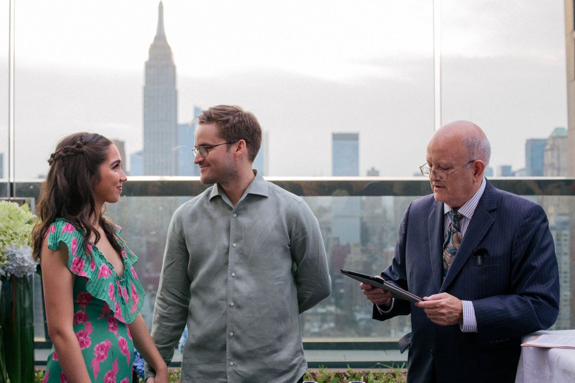 wedding officiant marrying young couple downtown New York City