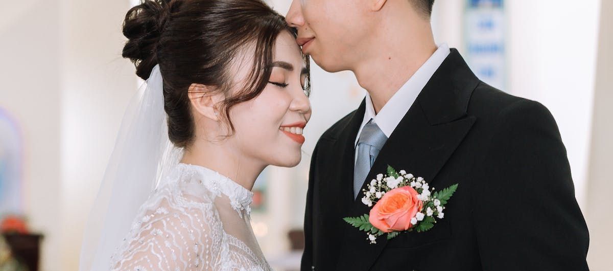 a couple prepares to wed with a ceremony rehearsal