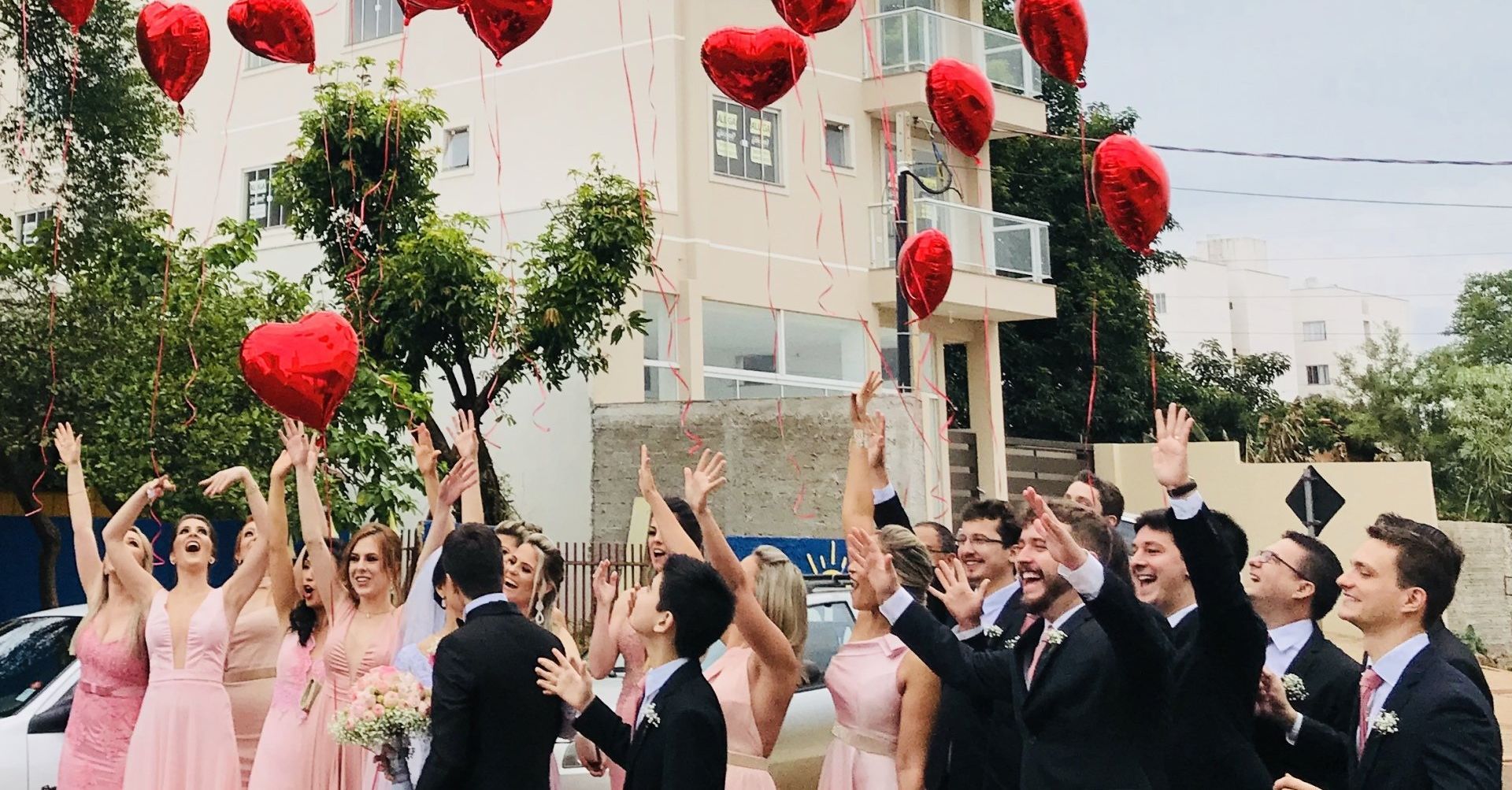 heart balloons being released at unique wedding ceremony