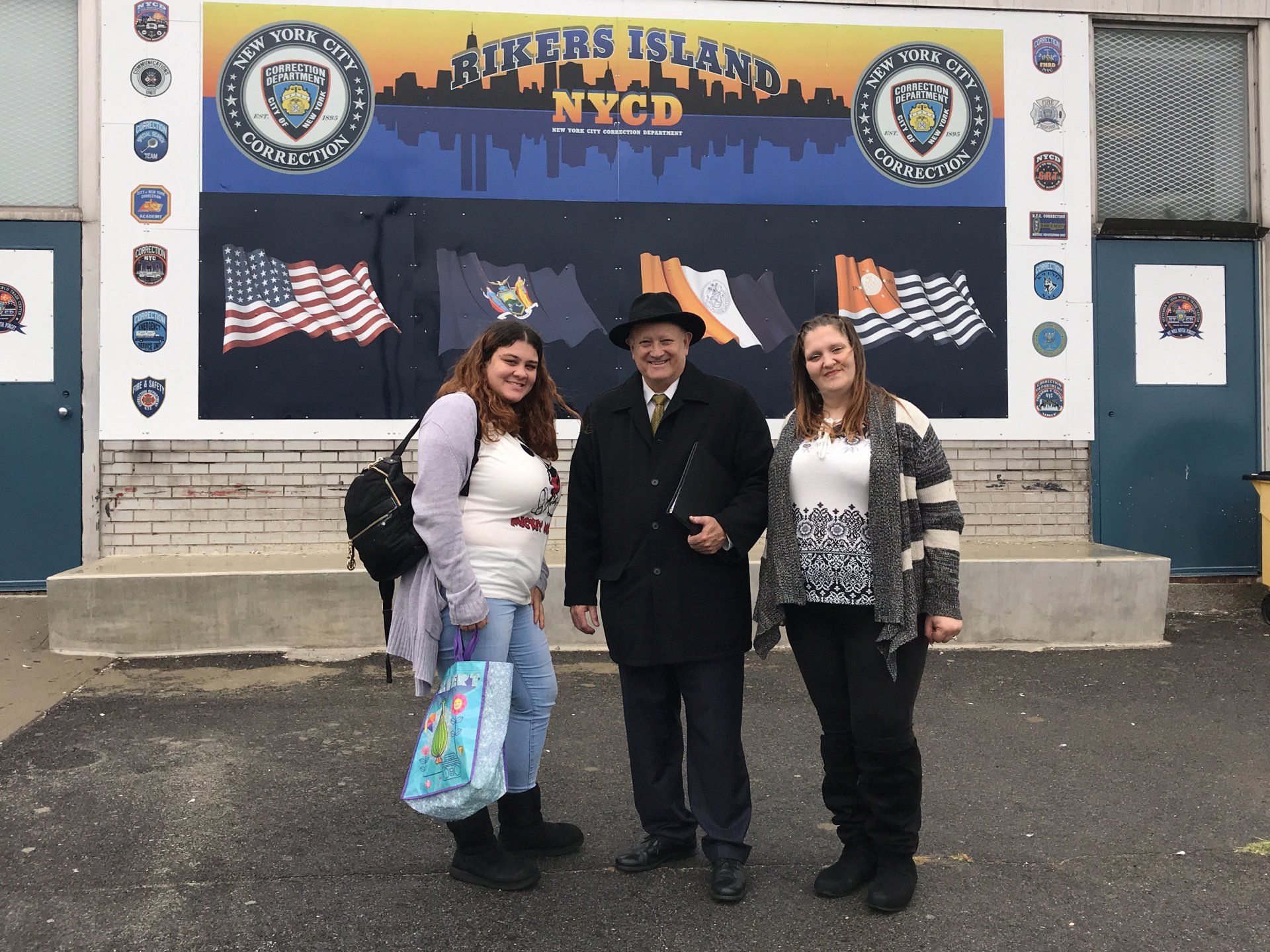 wedding officiant with couple at NYC landmark