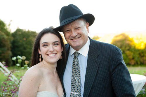 wedding officiant posing with newlywed bride in New York City Park