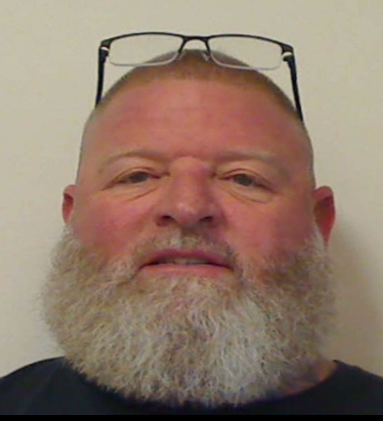 A silhouette of a person without a face on a white background.