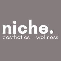 Clean, professional medical spa treatment room with neutral tones at Niche Regenerative Wellness in Anchorage