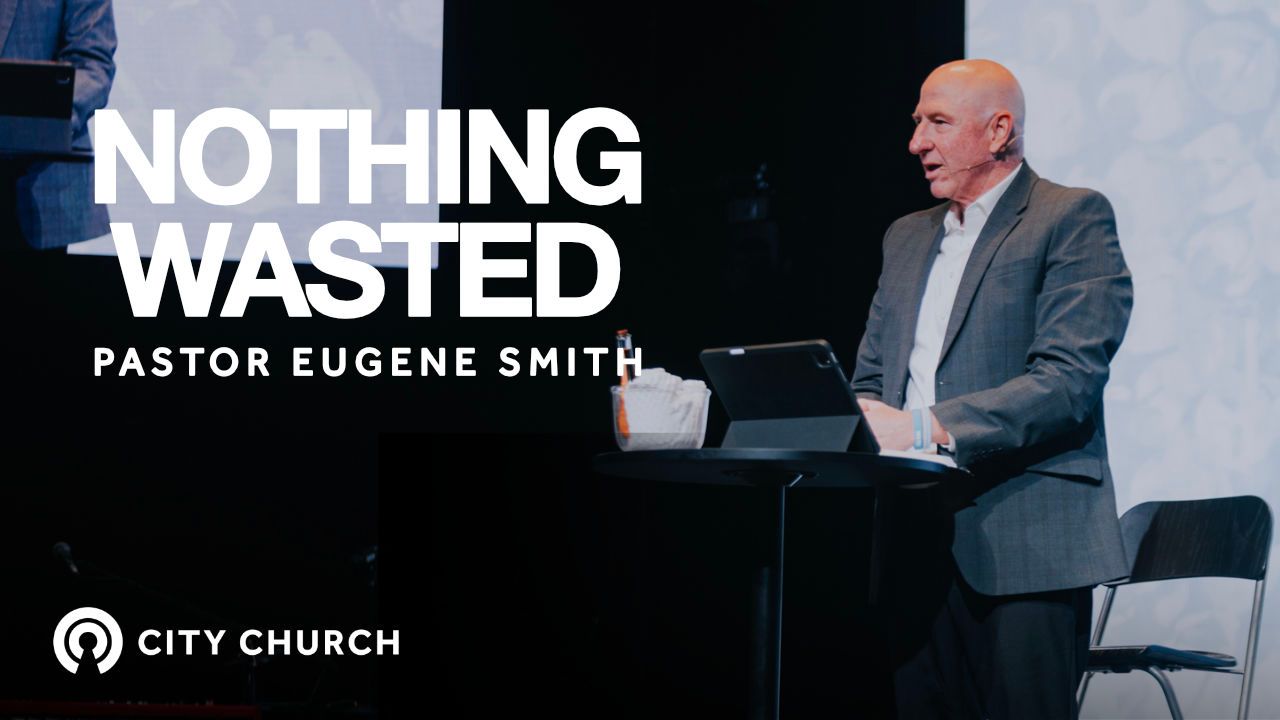 Pastor Eugene Smith preaching during the City Church message titled ‘Thankfulness Changes Everything’ with a blue illustrated background.