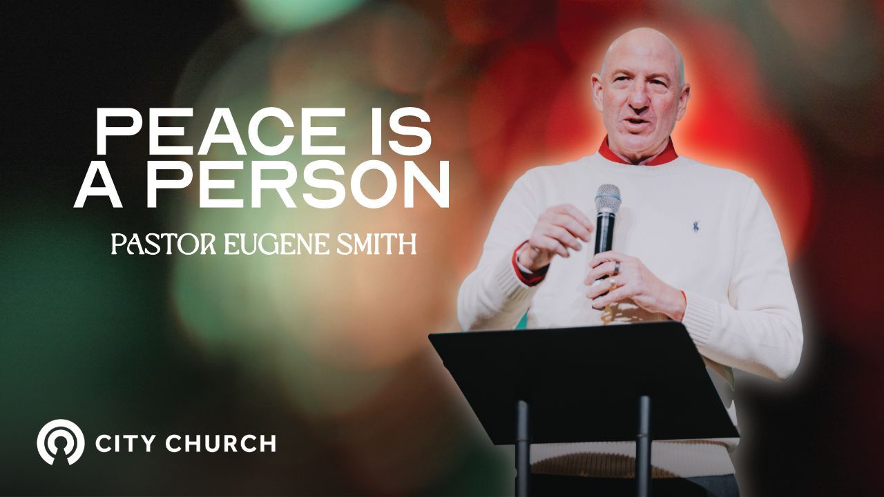 Pastor Eugene Smith preaching during the City Church message titled ‘Thankfulness Changes Everything’ with a blue illustrated background.