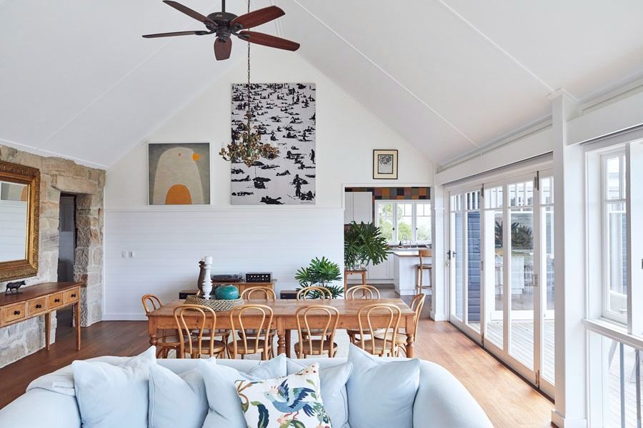 Bright Dining and Living Room with Vaulted Ceiling and Large Glass Doors — Fineworx Joinery in Warnervale, NSW