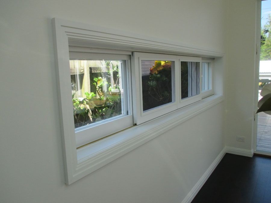 White Framed Horizontal Window in A Light Coloured Wall — Fineworx Joinery in Central Coast, NSW