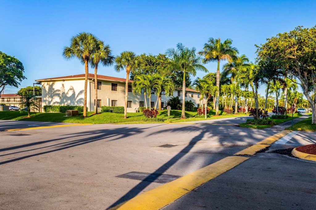 Property Exterior with Palm Trees| Casa Del Mar