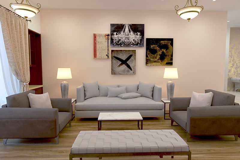 A living room with a couch and some lamps
