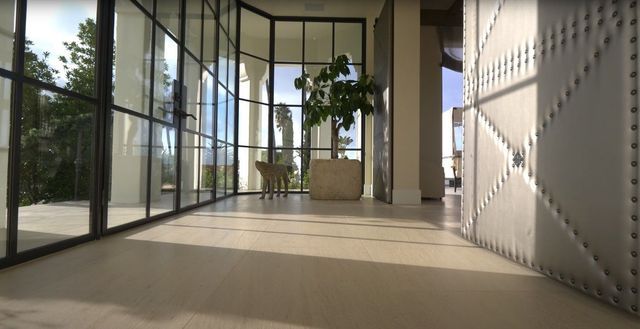 A hallway with lots of windows