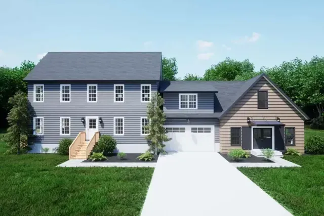 A house with a large ADU attached.