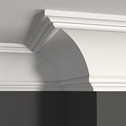 Close up of crown moulding and a dark grey wall